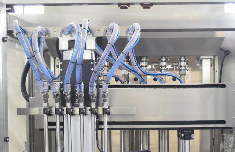 Semi-automatic linear six-head tracking fill packag machine